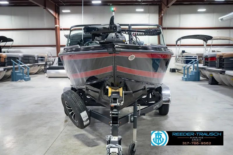 Slide: The Image of 2026 Lund 1975 Tyee boat on trailer in showroom, Reeder-Trausch Marine. - 4
