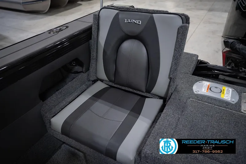 Slide: The Image of Gray and black seat in 2026 Lund 1975 Tyee boat, showroom display. - 42