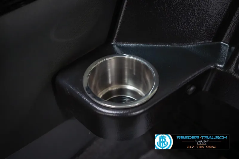 Slide: The Image of Cup holder in 2026 Lund 1975 Tyee boat interior, featuring sleek black design. - 44