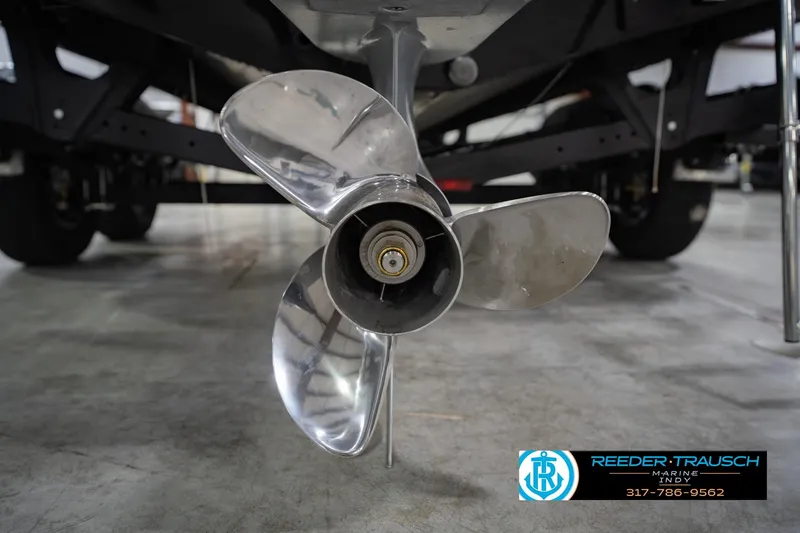 Slide: The Image of Close-up of a Lund 1975 Tyee 2026 boat propeller in a showroom. - 52