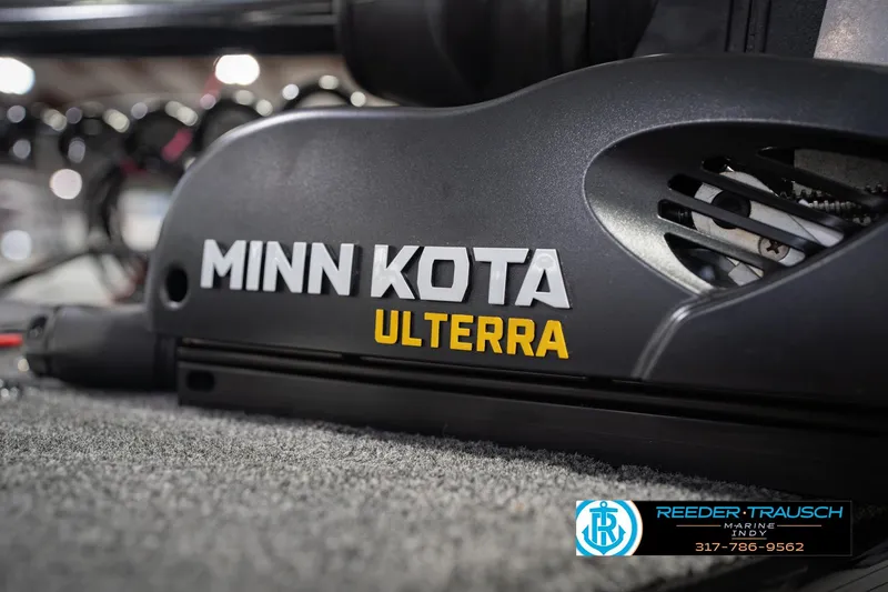 Slide: The Image of Minn Kota Ulterra motor on 2026 Lund 1975 Tyee boat, Reeder Trausch Marine logo visible. - 58