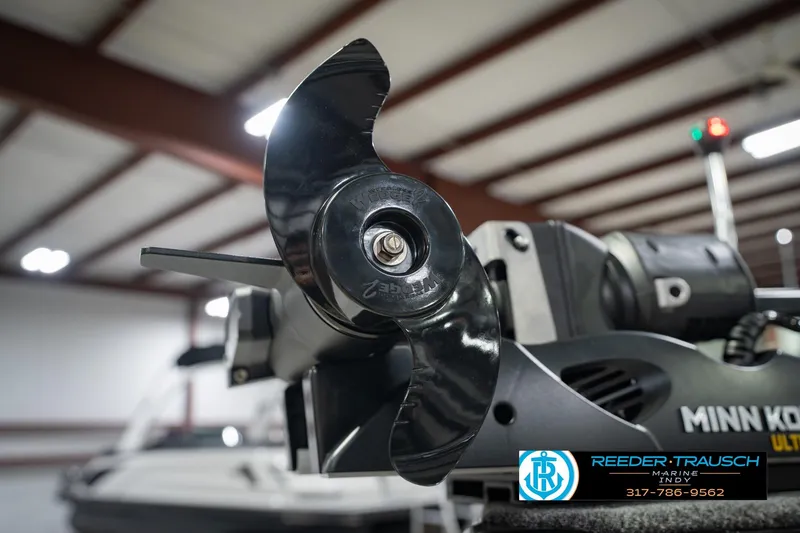 Slide: The Image of Close-up of a Minn Kota motor on a 2026 Lund 1975 Tyee boat. - 59
