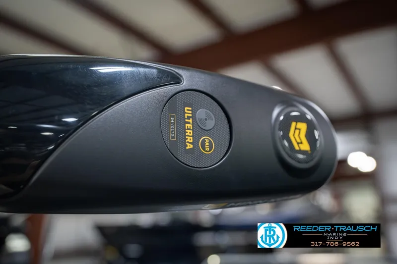 Slide: The Image of Close-up of a 2026 Lund 1975 Tyee boat control panel with Ulterra branding. - 60