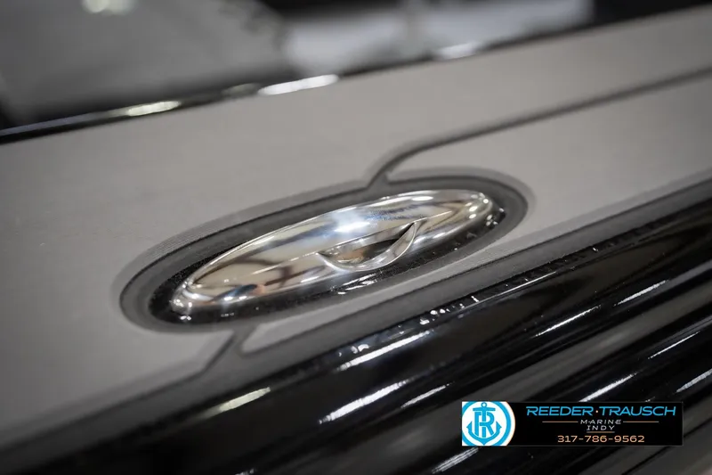 Slide: The Image of Close-up of 2026 Lund 1975 Tyee boat detail with sleek metallic finish. - 68