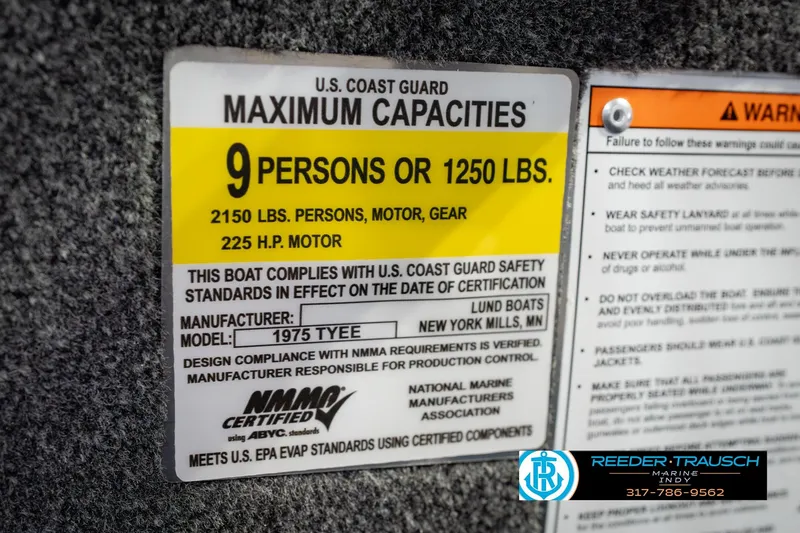 Slide: The Image of Label on Lund 1975 Tyee boat showing capacity and safety compliance details. - 70