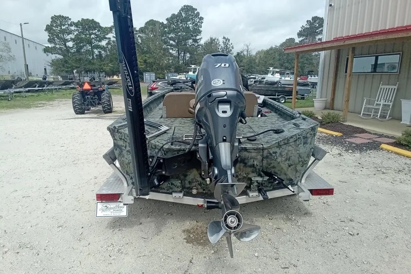 Slide: The Image of 2021 Excel 1860 Stalker SC boat with Yamaha motor on trailer, outdoor setting. - 9