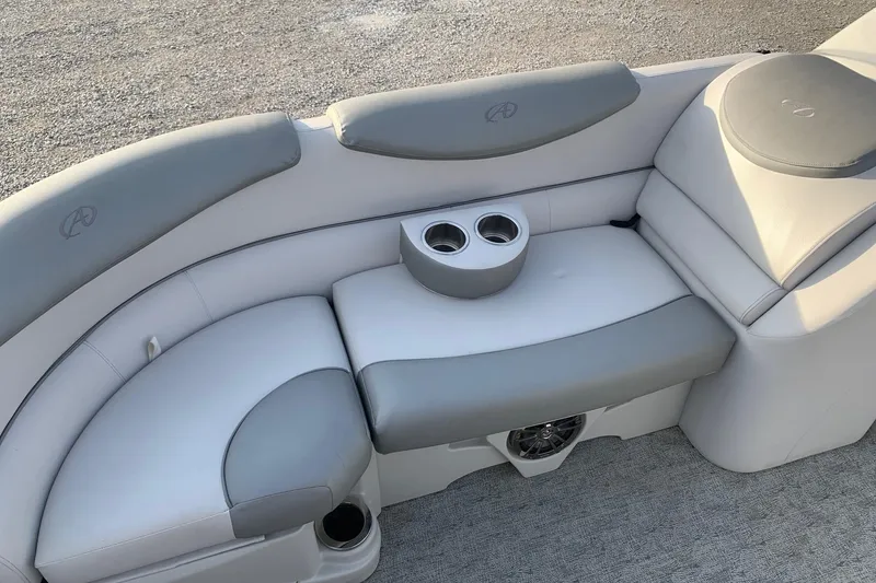 Slide: The Image of 2018 Avalon 2585 Catalina Quad Lounger with gray and white seating and cup holders. - 4