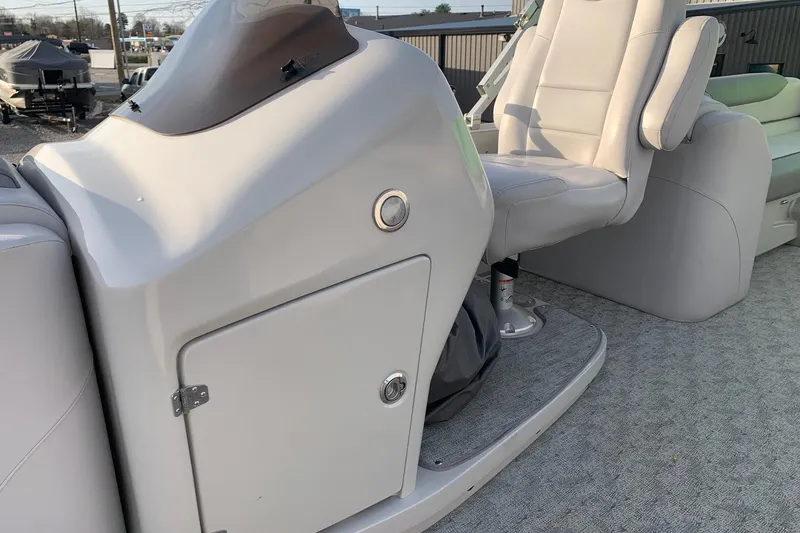 Slide: The Image of 2018 Avalon 2585 Catalina Quad Lounger helm and seating area, showcasing luxury design. - 7