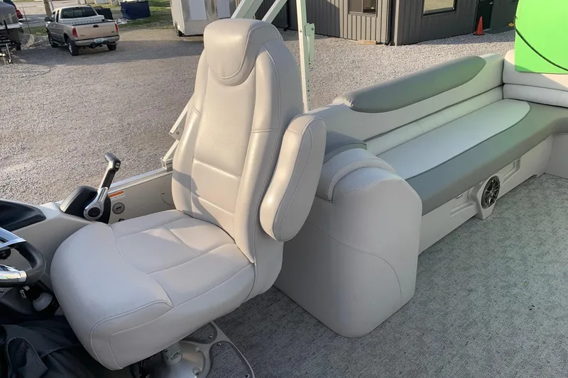 Slide: The Image of 2018 Avalon 2585 Catalina Quad Lounger interior with plush seating and modern controls. - 8