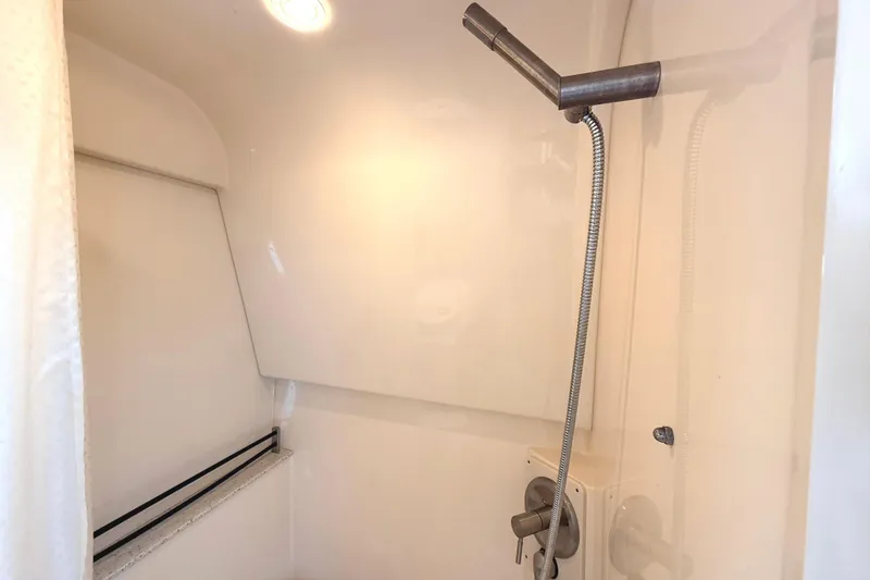 Slide: The Image of Shower area in 2013 Sea Ray 370 Venture boat with modern fixtures. - 22