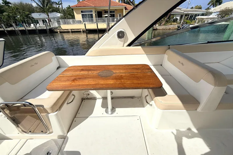 Slide: The Image of Manufacturer Provided Image: 2013 Sea Ray 370 Venture boat deck with seating and storage. - 5