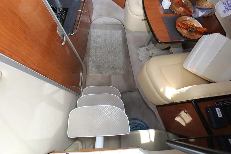 Slide: The Image of Interior of 2000 Chaparral Signature 300 boat with seating and dining area. - 15