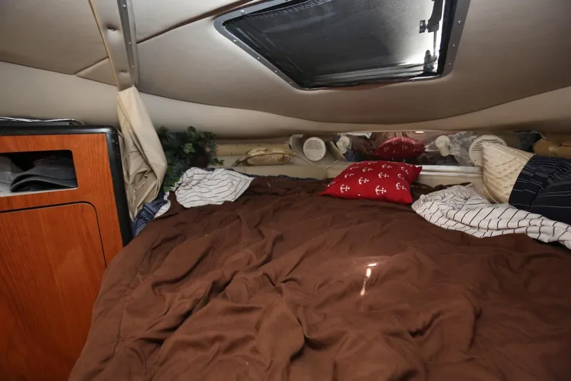 Slide: The Image of Cozy cabin interior of 2000 Chaparral Signature 300 with bed and skylight. - 38