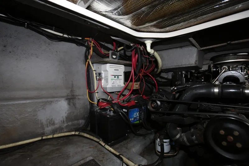 Slide: The Image of Engine compartment of a 2000 Chaparral Signature 300 boat with wiring and components. - 45
