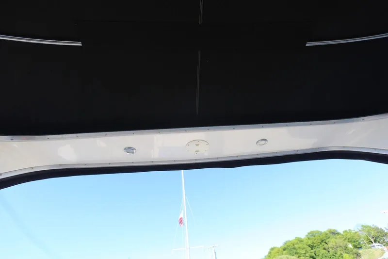 Slide: The Image of View from Chaparral Signature 300 boat, showcasing canopy and clear sky. - 71