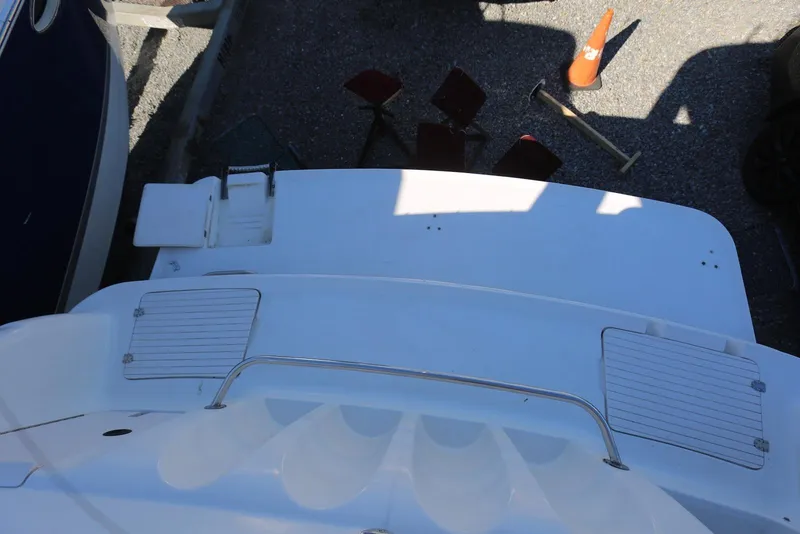 Slide: The Image of Rear view of 2000 Chaparral Signature 300 boat with swim platform and ladder. - 72