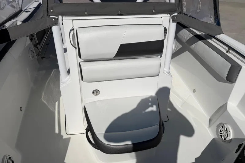 Slide: The Image of 2020 Blackfin 242 CC boat interior with white and black seating. - 39