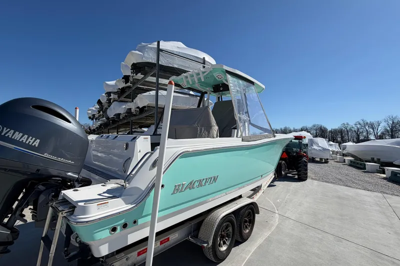 Slide: The Image of 2020 Blackfin 242 CC boat with Yamaha engine on trailer, outdoor storage. - 8
