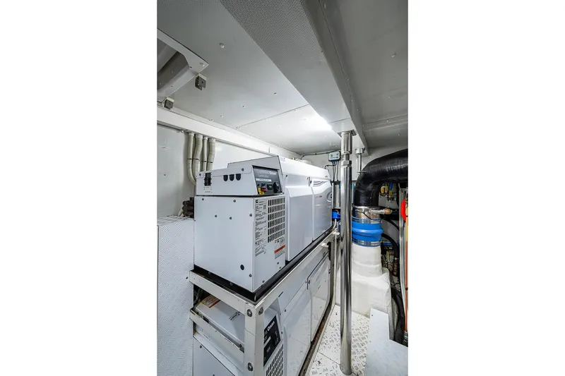 Slide: The Image of Engine room of 2017 Azimut 80 yacht, featuring modern equipment and piping. - 100