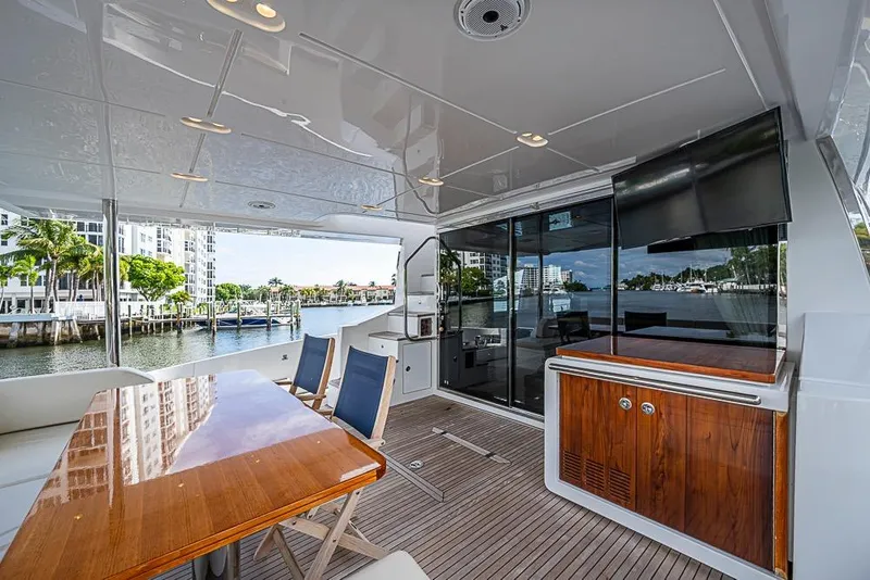 Slide: The Image of Luxurious 2017 Azimut 80 yacht deck with elegant seating and waterfront view. - 16