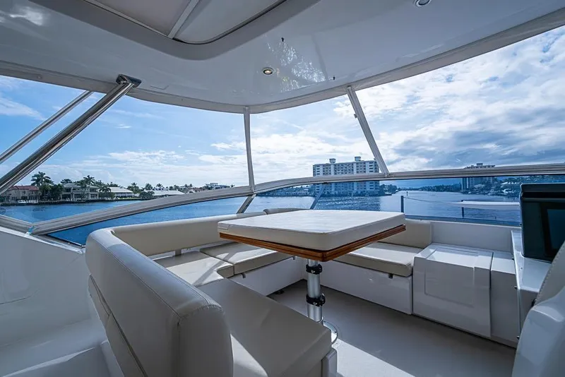 Slide: The Image of Luxurious 2017 Azimut 80 yacht interior with panoramic ocean view and elegant seating area. - 20