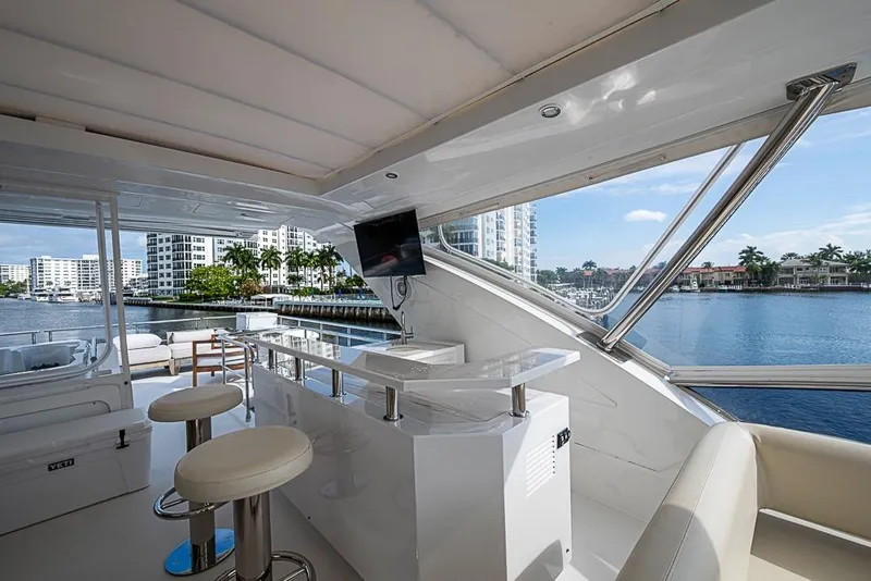 Slide: The Image of Luxurious 2017 Azimut 80 yacht interior with bar and waterfront view. - 21