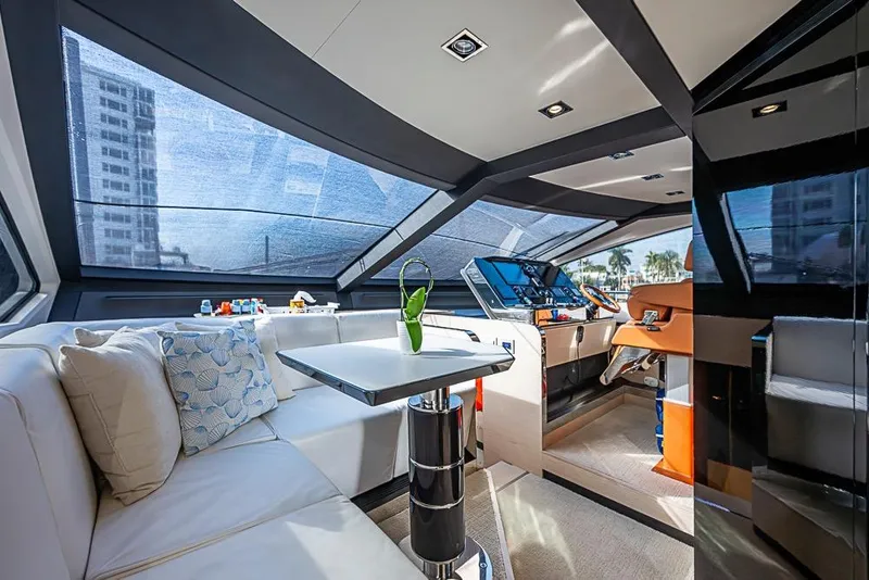 Slide: The Image of Luxurious interior of 2017 Azimut 80 yacht with modern seating and helm. - 49