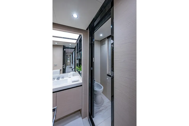 Slide: The Image of Luxurious bathroom interior of 2017 Azimut 80 yacht, featuring modern fixtures and elegant design. - 70