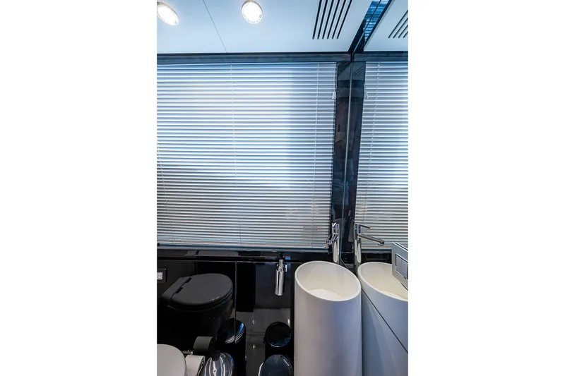 Slide: The Image of Luxurious bathroom interior of 2017 Azimut 80 yacht with modern fixtures and blinds. - 90