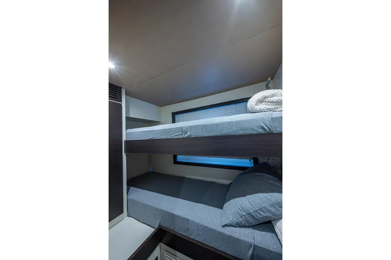 Slide: The Image of Bunk beds in 2017 Azimut 80 yacht cabin with modern design and cozy bedding. - 92