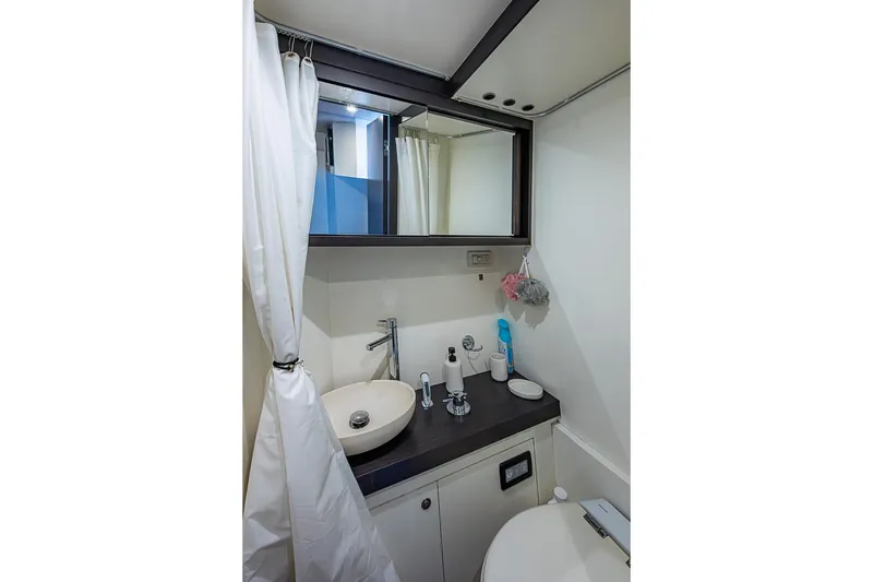 Slide: The Image of Luxurious bathroom in 2017 Azimut 80 yacht with modern fixtures and elegant design. - 93