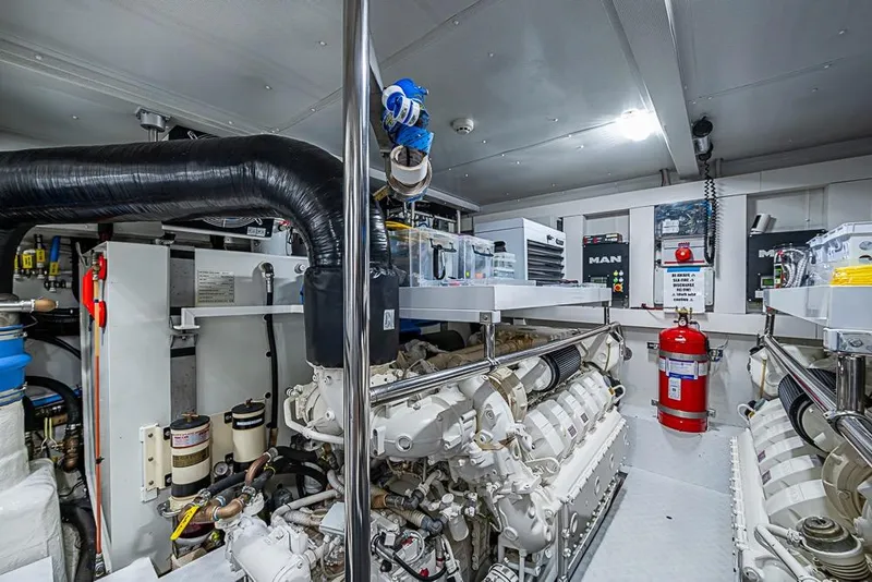 Slide: The Image of Engine room of 2017 Azimut 80 yacht, featuring advanced machinery and safety equipment. - 96