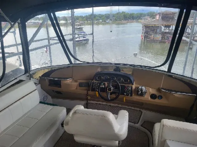 Slide: The Image of Interior view of 2001 Carver 396 yacht overlooking the water. - 10