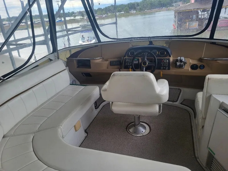 Slide: The Image of Interior of a 2001 Carver 396 yacht with helm station. - 11
