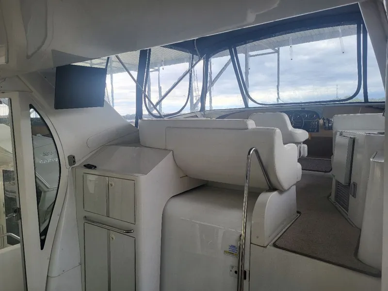 Slide: The Image of Interior of a 2001 Carver 396 yacht with helm station. - 16