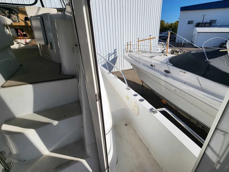 Slide: The Image of Interior of a 2001 Carver 396 yacht, view of the marina. - 17