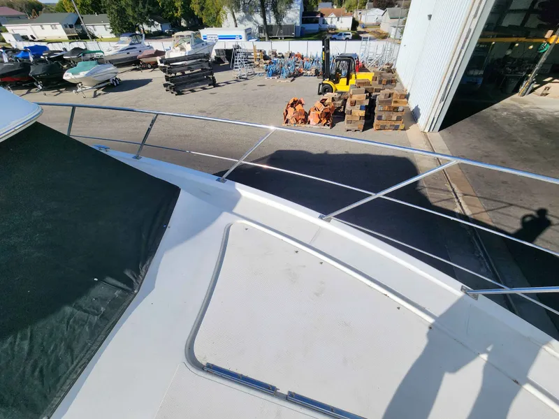 Slide: The Image of 2001 Carver 396 yacht in a boat storage facility. - 22