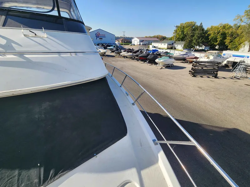 Slide: The Image of 2001 Carver 396 yacht on a boat lot. - 24