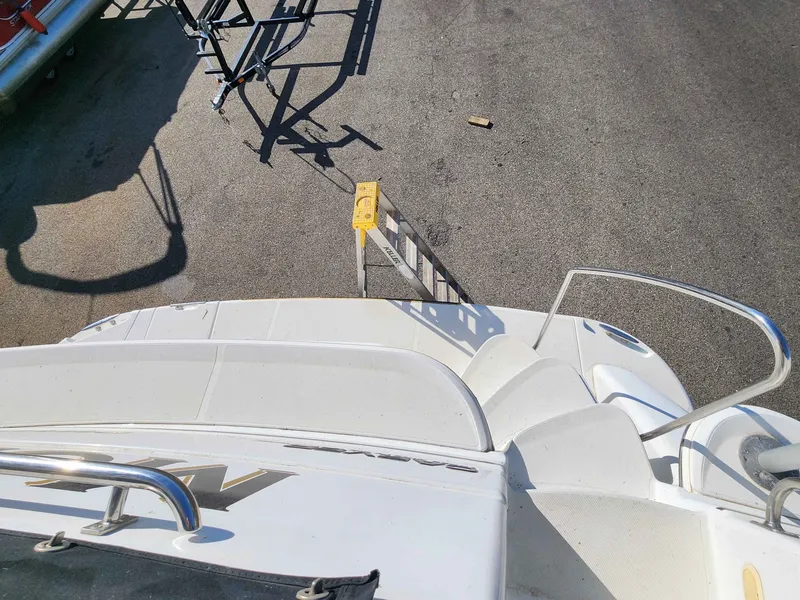 Slide: The Image of Top deck of a 2001 Carver 396 boat with ladder. - 29