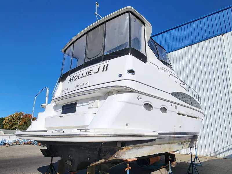 Slide: The Image of 2001 Carver 396 yacht on stands, side view. - 3