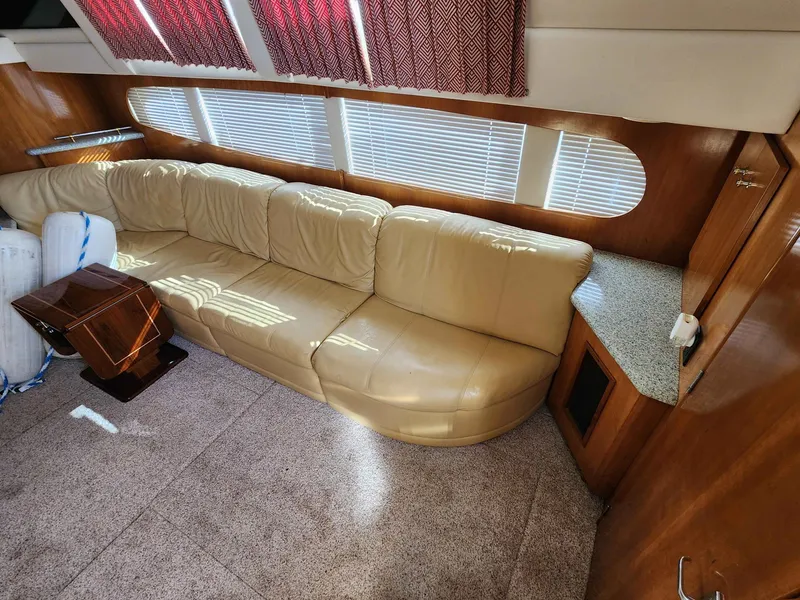 Slide: The Image of Interior of a 2001 Carver 396 yacht with leather sofa. - 32