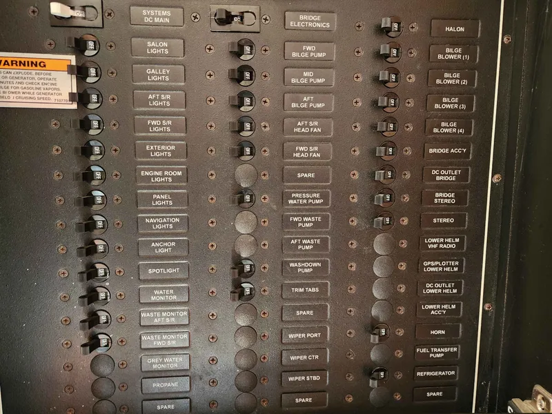 Slide: The Image of Control panel of a 2001 Carver 396 with various switches. - 37