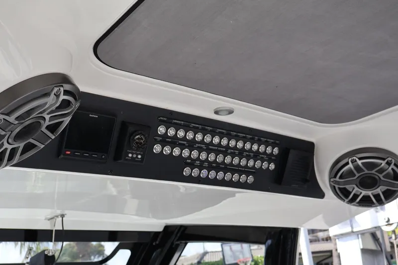 Slide: The Image of 2020 Blackwater 41 Performance Fish boat dashboard with speakers and control panel. - 14