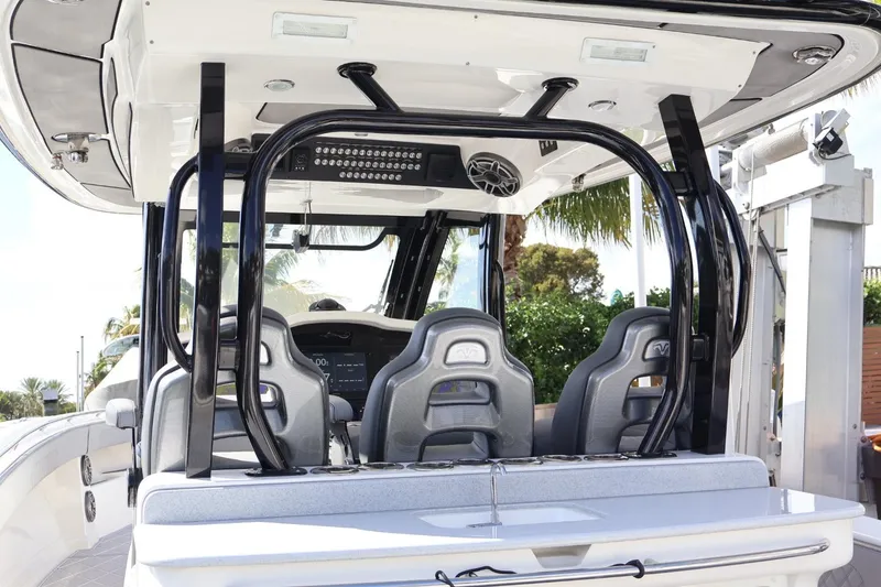 Slide: The Image of 2020 Blackwater 41 Performance Fish boat interior with modern seating and control panel. - 8