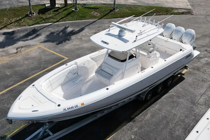 Slide: The Image of 2022 Intrepid 345 Nomad FE boat on trailer, aerial view. - 12