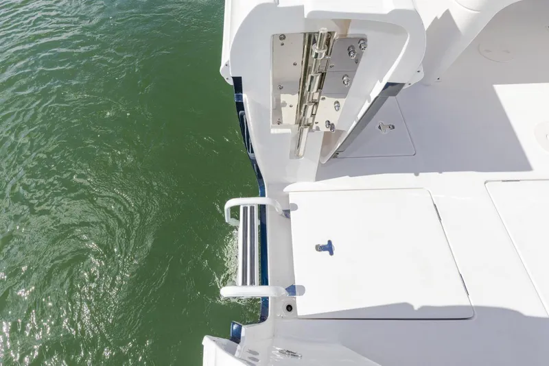 Slide: The Image of Manufacturer Provided Image: 2022 Intrepid 345 Nomad FE boat deck with water view. - 18