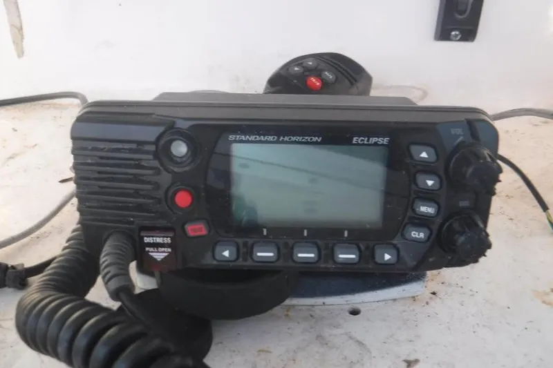 Slide: The Image of Standard Horizon Eclipse marine radio on 2006 PROLINE 31 Center Console. - 4