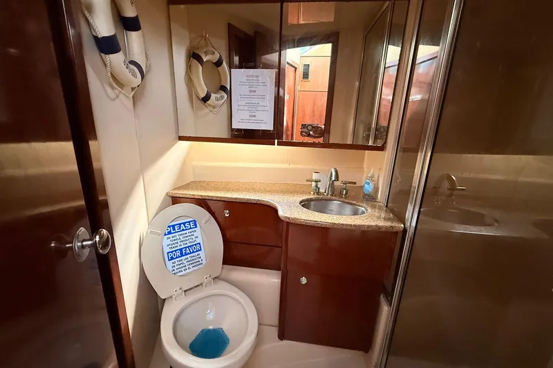 Slide: The Image of Bathroom interior of 2008 Meridian 341 Sedan yacht with sink and toilet. - 8