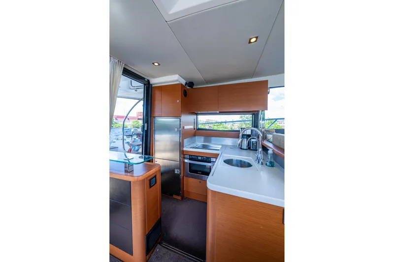 Slide: The Image of Luxurious kitchen interior of 2012 Prestige Flybridge yacht with modern appliances and sleek design. - 43