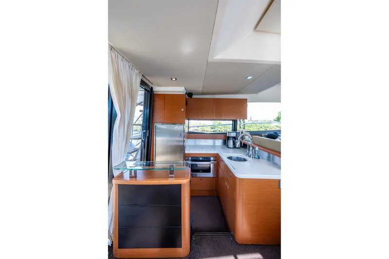 Slide: The Image of Luxurious kitchen interior of 2012 Prestige Flybridge yacht with modern appliances and sleek design. - 47